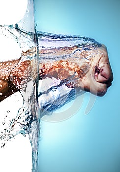 Male Fist Hitting Water