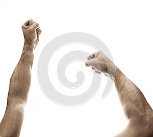 Male fists on an empty background - fight symbol