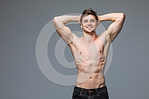 Male fitness model with muscular body portrait handsome hot young man with fit athletic body