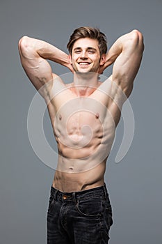 Male fitness model with muscular body portrait handsome hot young man with fit athletic