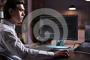 Male freelancer developing app software