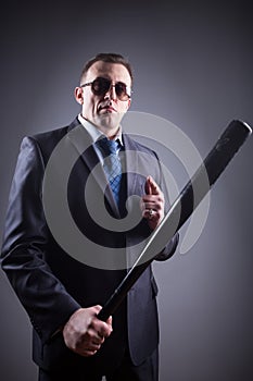 Male gangster with baseball bat