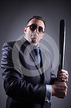 Male gangster with baseball bat