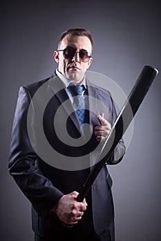 Male gangster with baseball bat