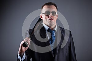 Male gangster with baseball bat