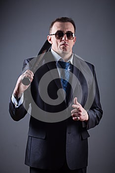 Male gangster with baseball bat
