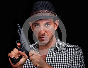 Male gangster loading gun