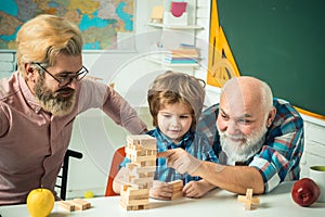 Male generations friendship. Happy little child father and grandparent leisure fun time. Grangfather, Father and son