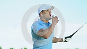 Male golf beginner player making long-distance shot, out of bounds hit, fail