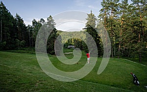 Male golf player on professional golf course.