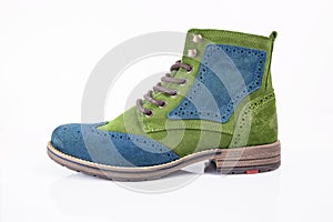 Male green and blue leather boot on white background.