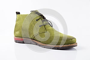 Male green leather boot on white background, isolated product.