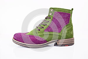 Male green and purple leather boot on white background.