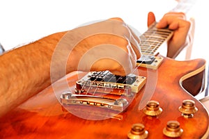 Male guitar player with electrical instrument