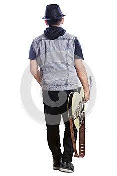 Male guitarist with guitar rear view 1