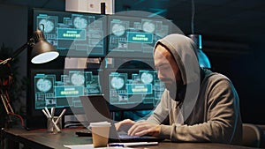 Male hacking thief working on security breach