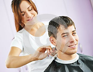 Male hairdresser at work