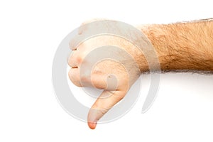Male hairy hand showing Dislike, unlike, fail, disagree sign, thumb down hand with white background and copy space