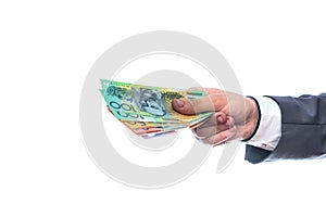 Male hand with australian dollars isolated on white