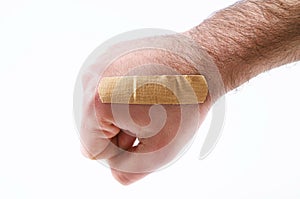 Male hand with band aid