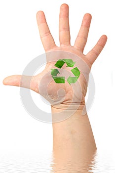 Male hand with drawing Recycle Symbol