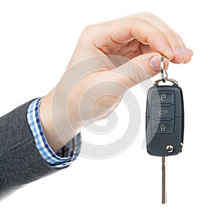 Male hand giving car keys - studio shot