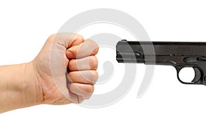 Male hand and a gun