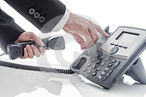 Male hand hanging up phone