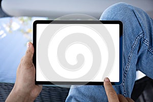 male hand hold computer tablet with isolated screen in cafe