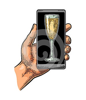 Male hand hold smartphone with bottle of champagne explosion