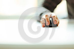 Male hand holding computer mouse