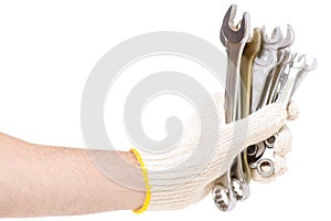 Male hand holding a construction key