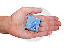 Male hand holding gift box