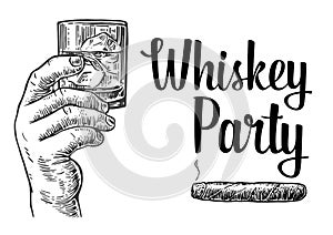Male hand holding a glass with whiskey and ice cubes. Hand drawn design element. Vintage vector engraving illustration for label, photo