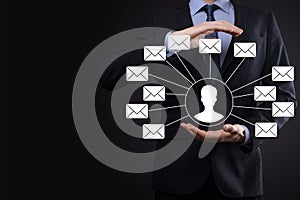 Male hand holding letter icon,email icons .Contact us by newsletter email and protect your personal information from spam mail.