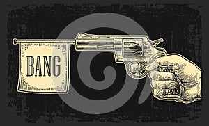 Male hand holding revolver with bang flag . Vector engraving vintage illustrations.