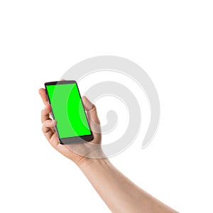 Male hand holds black smartphone. Isolated screen with chroma key and all isolated on white background