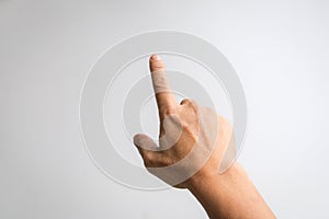 Male hand with index finger pointing to something