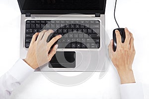 Male hand on keyboard and mouse