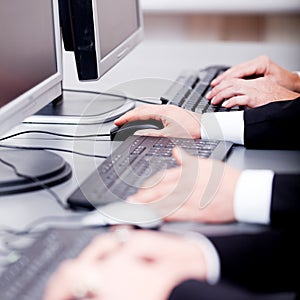 Male hand on keyboard typing and scroll mouse