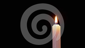 Male Hand Lights Paraffin Candle using a Match on a Black Background. 4K