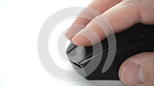 Male hand move computer mouse and click button on white background