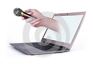 Male hand with notebook and with microphone