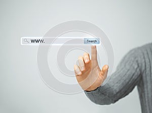 Male hand pressing Search button