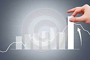 Male Hand Pulling Bar of Graph Chart