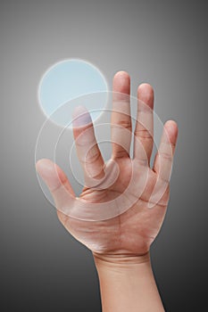 Male hand pushing on touch screen interface