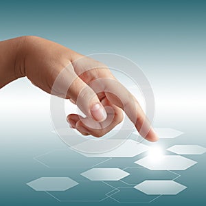 Male hand pushing on touch screen interface