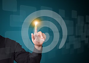 Male hand pushing on touch screen interface