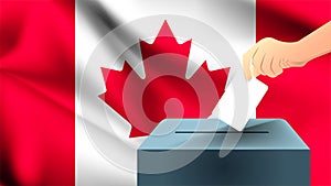 Male hand puts down a white sheet of paper with a mark as a symbol of a ballot paper against the background of the Canada flag, Ca