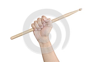 Male hand raising or holding drum sticks isolated on white backg